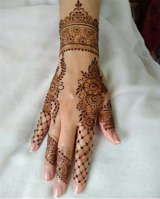 Curves Inspired Cultural Back Hand Mehndi Design